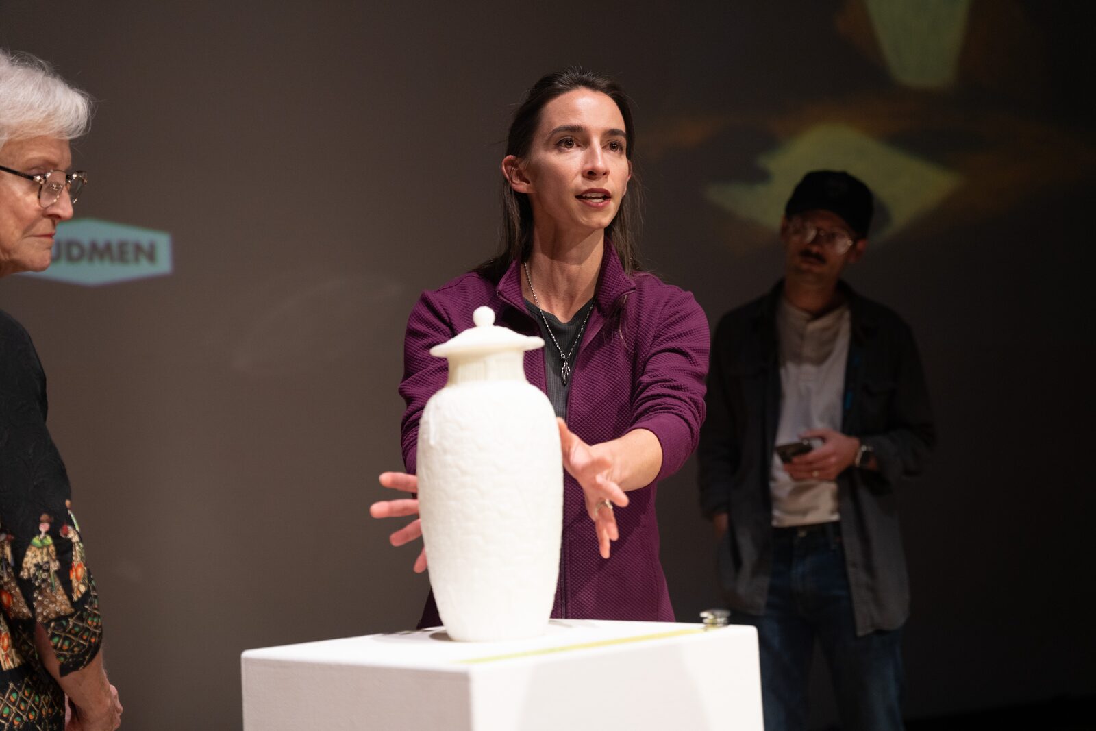 Stephanie presenting a 3D-printed replica of the Scarab Vase